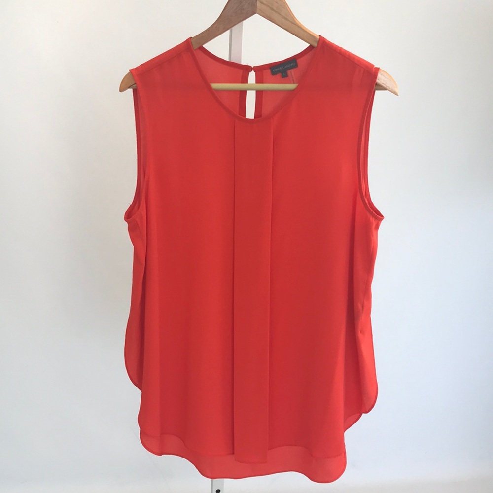 Red orange chiffon top.